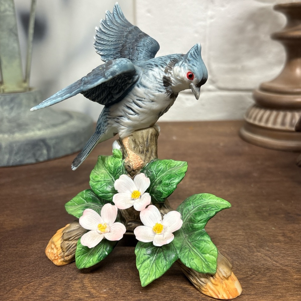 Decorative Bird Figurine with Green Leaves